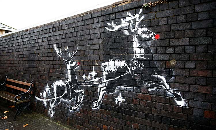 gulf homeless reindeer mural rough