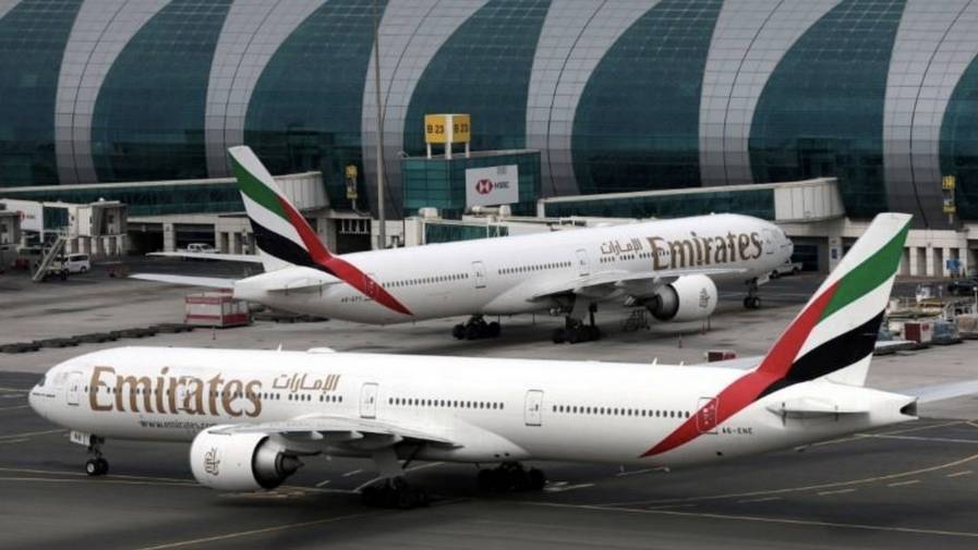emirates covid rules passengers flights
