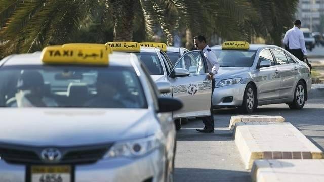 abu-dhabi payment taxis transport passengers