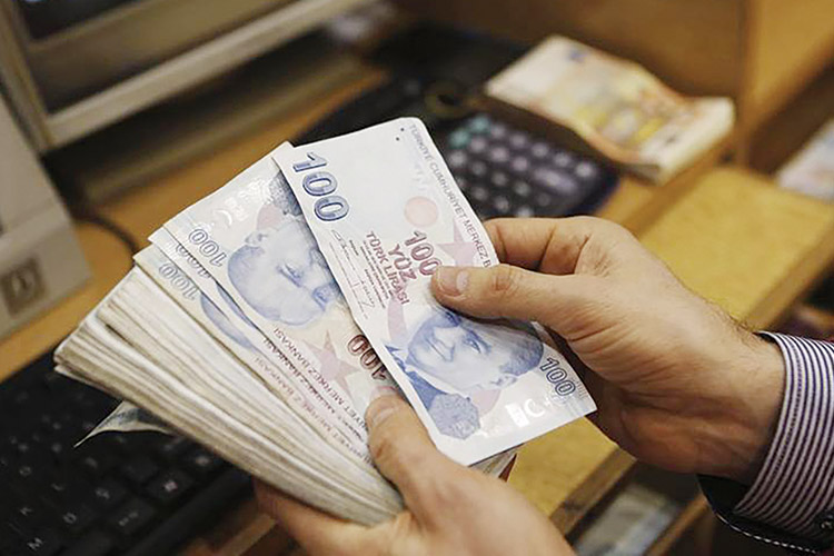 gulf turkish bank trims rates