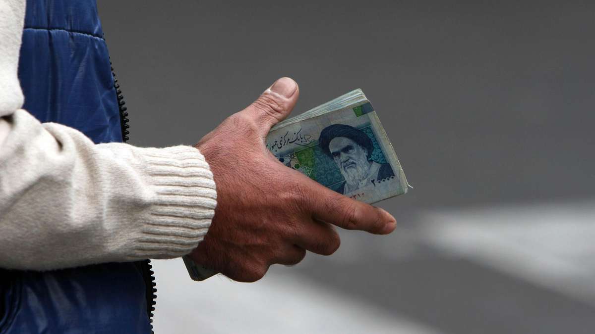 uk rebuke iranian currency dollar